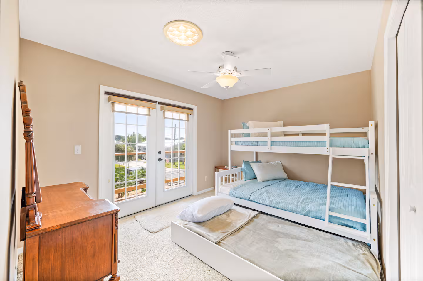Second bedroom with bunk bed and trundle